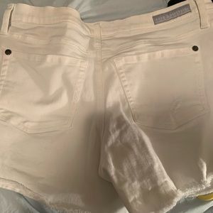 Women’s distressed white jean shorts
